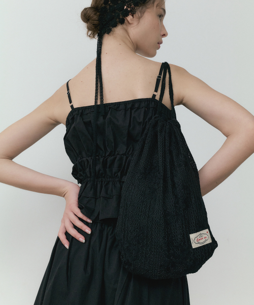 LUCIR ZU(ルシールズ)の「Wildflower Lace String Backpack (black)(バックパック/リュック・レディース・その他・FREE)」の1枚目の写真
