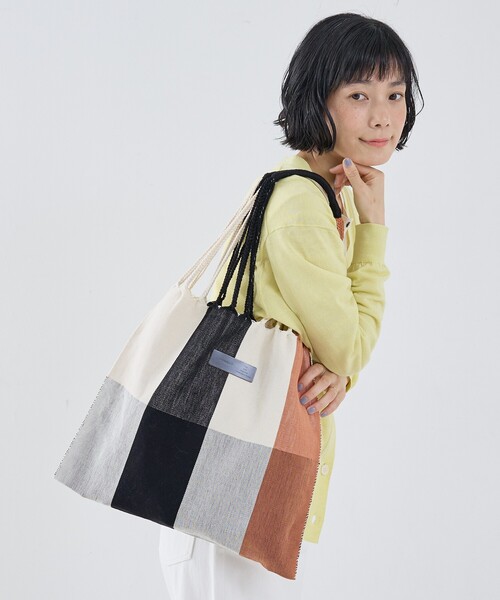 Moon Bird(ムーンバード)の「【MOON BIRD/ムーンバード】手織りハンモックバッグ(かごバッグ・レディース・アイボリー/セージグリーン/ブラウン・フリー)」の2枚目の写真