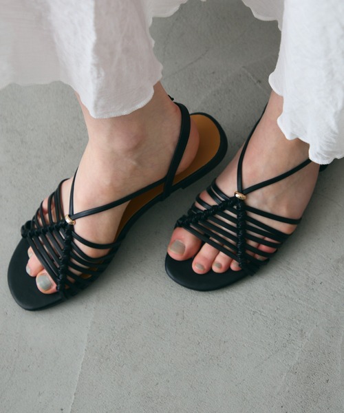 Trish(トリッシュ)の「メッシュストラップサンダル(サンダル・レディース・ゴールド/ブラック・LARGE/MEDIUM)」の1枚目の写真