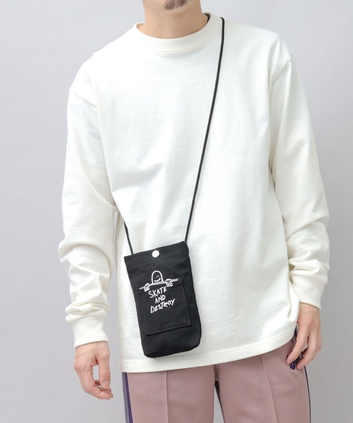 THRASHER（スラッシャー）の「THRASHER × Mark Gonzales キャンバス スマホポーチ（ショルダーバッグ・メンズ・オフホワイト/ブラック・FREE）」の4枚目の写真