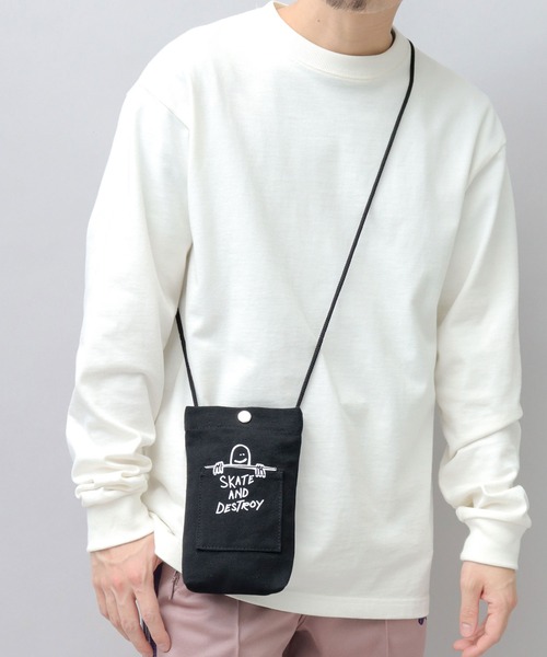 THRASHER（スラッシャー）の「THRASHER × Mark Gonzales キャンバス スマホポーチ（ショルダーバッグ・メンズ・オフホワイト/ブラック・FREE）」の3枚目の写真