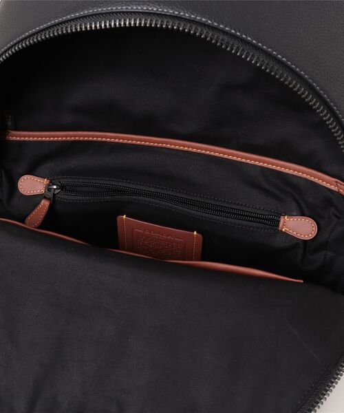 COACH（コーチ）の「チャーター バックパック・マキシ シグネチャー