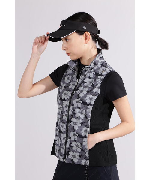 New Balance Golf(ニューバランスゴルフ)の「【new balance golf】【直営店舗限定】ハイビスカス総柄 フルジップ ベスト (WOMENS)(ベスト・レディース・ベージュ/ブラック・SMALL/MEDIUM)」の6枚目の写真