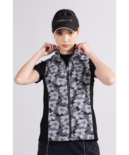 New Balance Golf(ニューバランスゴルフ)の「【new balance golf】【直営店舗限定】ハイビスカス総柄 フルジップ ベスト (WOMENS)(ベスト・レディース・ベージュ/ブラック・SMALL/MEDIUM)」の2枚目の写真