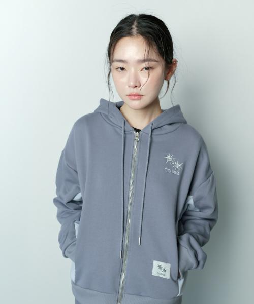 COIRIS(コイリス)の「ビプルセットアップサイド切り替え配色フードジップアップ男女共用(パーカー・レディース・グレー系・FREE)」の10枚目の写真