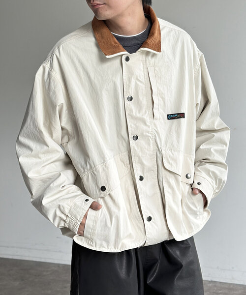 CPCM（シーピーシーエム）の「NCスタンドネックデカポケブルゾン（ブルゾン・メンズ・オレンジ/ブラック/アイボリー・MEDIUM/LARGE）」の4枚目の写真