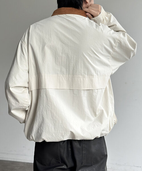 CPCM（シーピーシーエム）の「NCスタンドネックデカポケブルゾン（ブルゾン・メンズ・オレンジ/ブラック/アイボリー・MEDIUM/LARGE）」の6枚目の写真