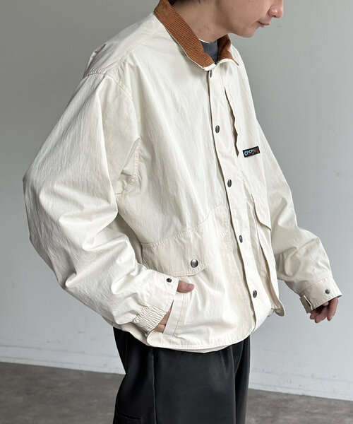 CPCM（シーピーシーエム）の「NCスタンドネックデカポケブルゾン（ブルゾン・メンズ・オレンジ/ブラック/アイボリー・MEDIUM/LARGE）」の7枚目の写真