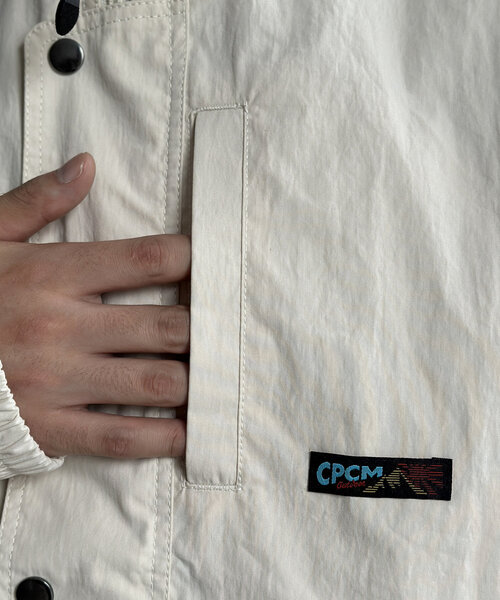 CPCM（シーピーシーエム）の「NCスタンドネックデカポケブルゾン（ブルゾン・メンズ・オレンジ/ブラック/アイボリー・MEDIUM/LARGE）」の11枚目の写真