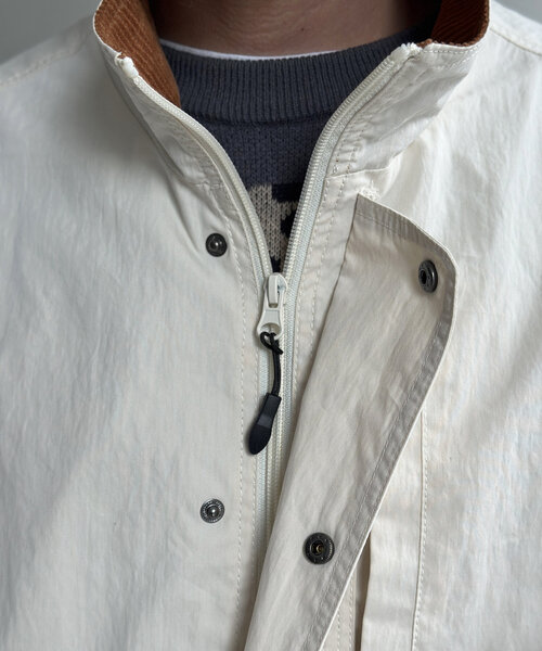 CPCM（シーピーシーエム）の「NCスタンドネックデカポケブルゾン（ブルゾン・メンズ・オレンジ/ブラック/アイボリー・MEDIUM/LARGE）」の12枚目の写真