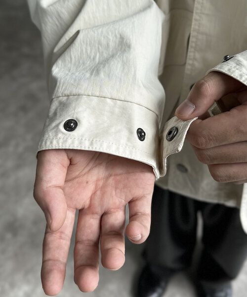 CPCM（シーピーシーエム）の「NCスタンドネックデカポケブルゾン（ブルゾン・メンズ・オレンジ/ブラック/アイボリー・MEDIUM/LARGE）」の15枚目の写真