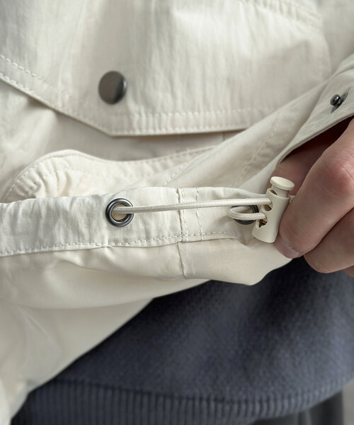 CPCM（シーピーシーエム）の「NCスタンドネックデカポケブルゾン（ブルゾン・メンズ・オレンジ/ブラック/アイボリー・MEDIUM/LARGE）」の17枚目の写真