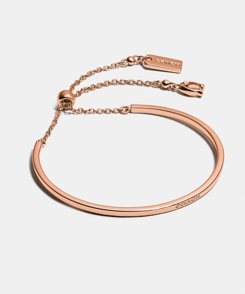 COACH(コーチ)の「シグネチャー スライダー バングル(ブレスレット・レディース・ピンク系その他・フリ-)」の1枚目の写真