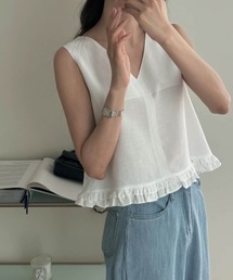 Nyu（ニュウ）の「Vネック裾フリルフレアトップス（シャツ/ブラウス）」