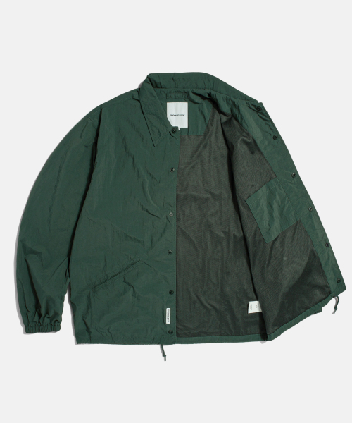 ESPIONAGE(エスピオナジ)の「Grocery Store Staff Coach Jacket Dark Green(ナイロンジャケット・レディース・その他・MEDIUM/LARGE/X-LARGE)」の2枚目の写真