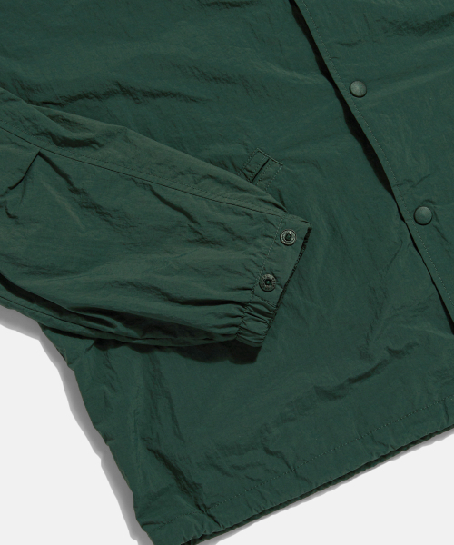 ESPIONAGE(エスピオナジ)の「Grocery Store Staff Coach Jacket Dark Green(ナイロンジャケット・レディース・その他・MEDIUM/LARGE/X-LARGE)」の9枚目の写真