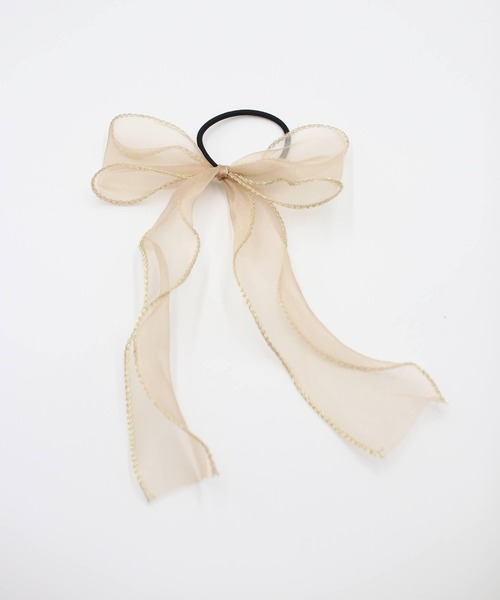 Rora(ローラ)の「ハンク ロングリボン ヘアゴム (3color) 黒 白 ゴールド(ヘアゴム・キッズ・ホワイト/ブラック/ゴールド・FREE)」の3枚目の写真