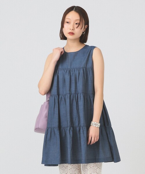GYMPHLEX(ジムフレックス)の「Gymphlex / ティアード ノースリーブ チュニック(シャツ/ブラウス・レディース・ホワイト/ネイビー・14)」の1枚目の写真