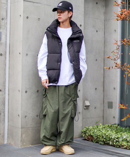 SPINNS（スピンズ）の「【ユニセックスで着用可能】スタンドカラーフェイクダウンベスト　ワッペン（ダウンベスト・メンズ・ブラック・ONESIZE）」の18枚目の写真