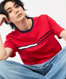TOMMY HILFIGER（トミーヒルフィガー）の「【オンライン限定】【ユニセックス】トミーヒルフィガーロゴTシャツ / TINO TEE（Tシャツ/カットソー）」