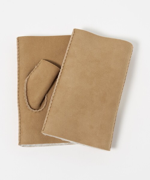 UNITED ARROWS(ユナイテッドアローズ)の「ムートン フィンガーレス グローブ(手袋・メンズ・ベージュ・FREE)」の1枚目の写真