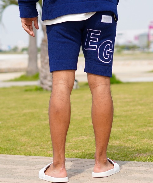 adamsJUGGLER（アダムスジャグラー）の「RTEGフェザーモールアーチロゴショートパンツ（その他パンツ・メンズ・ネイビー/イエロー・M/S/L/XL）」の10枚目の写真