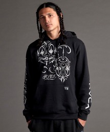 RVCA（ルーカ）の「RVCA/ルーカ×Mr.Cartoonコラボモデル プリントパーカー プルオーバーフーディ/ヘビーウェイト 裏起毛/セットアップ対応 BC042-028（パーカー）」