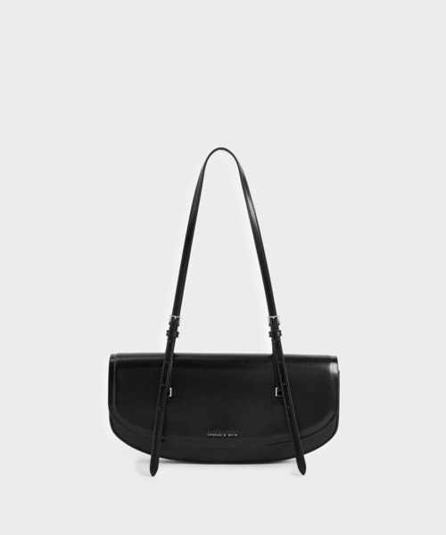CHARLES & KEITH（チャールズ & キース）の「イロンゲイテッド サドルバッグ / Elongated Saddle Bag（ショルダーバッグ・レディース・ブラック/ブラウン・S）」の2枚目の写真