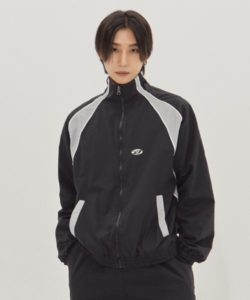 BORN CHAMPS(ボーンチャンプス)の「CHMPS スポーティロゴトラックジャケット B23FT19BK(ナイロンジャケット・メンズ・ブラック・LARGE/MEDIUM/SMALL)」の1枚目の写真