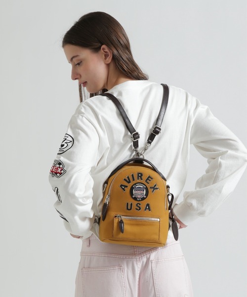 AVIREX(アヴィレックス)の「《直営店限定》LX VARSITY LEATHER MINI BACK PACK(バックパック/リュック・レディース・マスタード・F)」の2枚目の写真