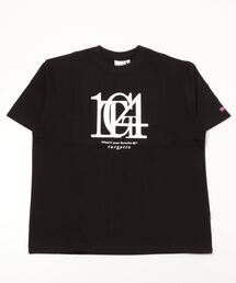 TARGETTO（ターゲット）の「A'GEM/9 × .kom『TARGETTO/ターゲット』TGT14 TEE SHIRT/フロントロゴ 半袖 Tシャツ カットソー（Tシャツ/カットソー・メンズ）」