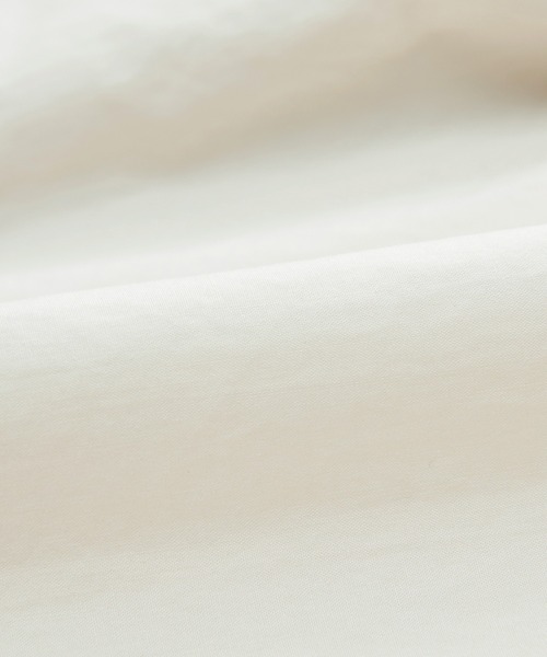 JNBY（ジェーエヌビーワイ）の「Utility V-neck Belted Jacket（ベスト・レディース・ブラック/ホワイト・36/38）」の9枚目の写真