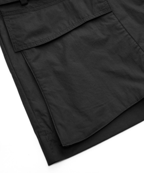 JNBY（ジェーエヌビーワイ）の「Utility V-neck Belted Jacket（ベスト・レディース・ブラック/ホワイト・36/38）」の21枚目の写真