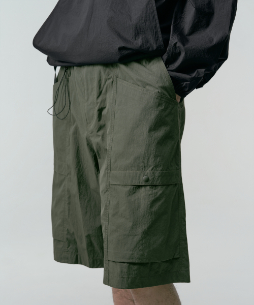 MUSINSA STANDARD（ムシンサスタンダード）の「[シティレジャー] ベルト付きユーティリティバermudaパンツ [カーキ]（その他パンツ・メンズ・その他・26/27/28/29/30/31/32/33/34/36/38/40/42）」の7枚目の写真