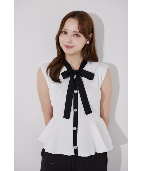 tocco closet(トッコ クローゼット)の「ボウタイリボン付き配色ペプラムニットプルオーバー(ニット/セーター・レディース・ブラック/ピンク系/オフホワイト・M)」の9枚目の写真