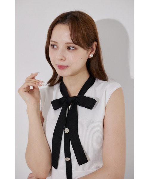 tocco closet(トッコ クローゼット)の「ボウタイリボン付き配色ペプラムニットプルオーバー(ニット/セーター・レディース・ブラック/ピンク系/オフホワイト・M)」の10枚目の写真