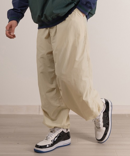 SlashDate(スラッシュデイト)の「ワイドシルエットナイロンカラースノーパンツ/ミリタリーパンツ/パラシュートパンツ/ストリート/ユニセックス(カーゴパンツ・メンズ・グリーン/パープル/ベージュ/イエロー/オレンジ/ブラック/オリーブ/チャコールグレー/オフホワイト・S/M/L)」の10枚目の写真