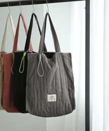 colleca la（コレカラ）の「［ロープチャーム付き］プリーツトートバッグ（トートバッグ）」
