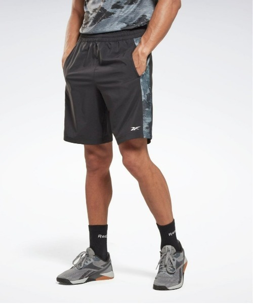 Reebok(リーボック)の「トレイン カモ ウォウブン ショートパンツ / TRAIN CAMO WOVEN SHORT(その他パンツ・メンズ・グリーン/ブラック/アーミー/ネイビー・LARGE/X-LARGE/X-SMALL/SMALL/MEDIUM/XX-LARGE/XXX-LARGE)」の1枚目の写真