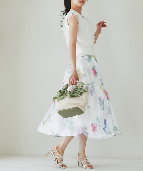 tocco closet(トッコ クローゼット)の「チュールフリル付きパール釦ニットベスト(ベスト・レディース・オフホワイト/ネイビー・M)」の6枚目の写真