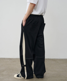 ALYSS（アリス）の「サイドパネルパラシュートスウェットパンツ[クリームブラック]（スウェットパンツ）」