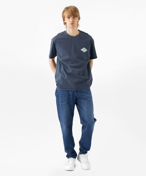 tommy jeans(トミー ジーンズ)の「リラックスバーシティグラフィックTシャツ(Tシャツ/カットソー・メンズ・ベージュ/ネイビー/ピンク・LARGE/MEDIUM/SMALL/X-LARGE)」の6枚目の写真
