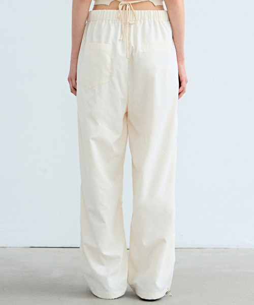 NICK&NICOLE（ニックアンドニコール）の「MINIMAL PARACHUTE PANTS_CREAM（スウェットパンツ・レディース・その他・FREE）」の4枚目の写真