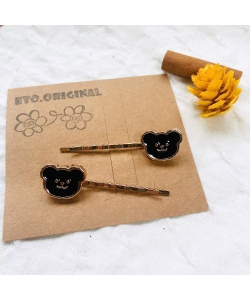 tone（トーン）の「【eto】くま ヘアピン 2個セット(MA)（シュシュ・レディース・ホワイト/イエロー/ブラック・FREE）」の2枚目の写真
