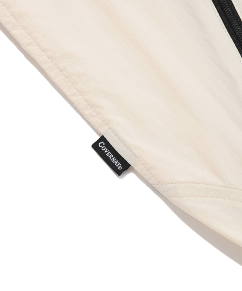 COVERNAT（カバーナット）の「軽量パッカブルウインドブレーカーエクリュ（ナイロンジャケット・レディース・その他・SMALL/MEDIUM/LARGE/X-LARGE/X-SMALL）」の10枚目の写真