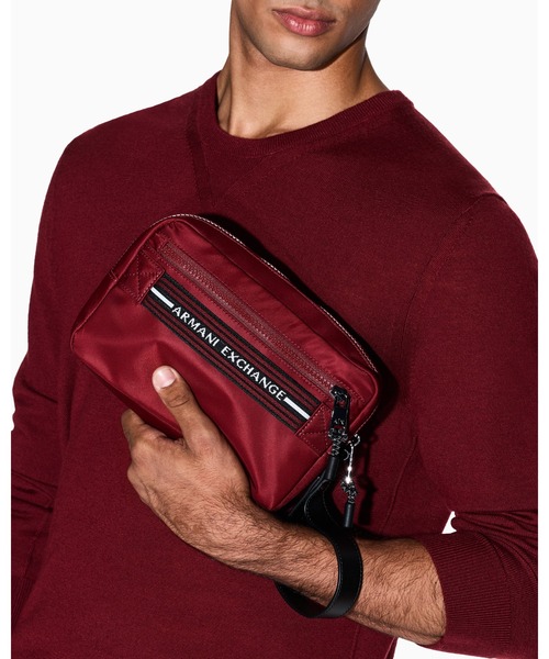 ARMANI EXCHANGE(アルマーニエクスチェンジ)の「【A|X アルマーニ エクスチェンジ】ロゴハンドル ポーチ/セカンドバッグ(ポーチ・メンズ・レッド・FREE)」の1枚目の写真
