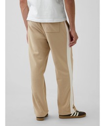 GAP（ギャップ）の「ヴィンテージソフト リラックスフィット 1969GAPロゴ トラックパンツ（スウェットパンツ）」