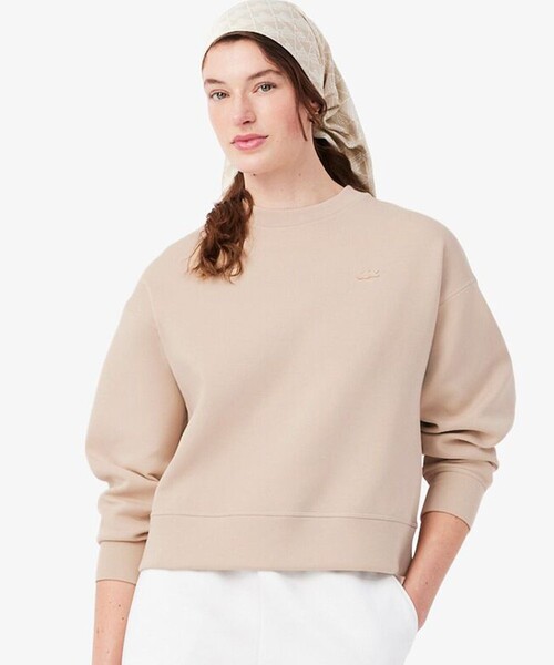 LACOSTE（ラコステ）の「オーバーサイズダブルフェイスジャージ クルーネックスウェットシャツ（スウェット・レディース・ホワイト/ベージュ・38/40/36/34）」の2枚目の写真