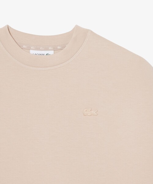 LACOSTE（ラコステ）の「オーバーサイズダブルフェイスジャージ クルーネックスウェットシャツ（スウェット・レディース・ホワイト/ベージュ・38/40/36/34）」の6枚目の写真