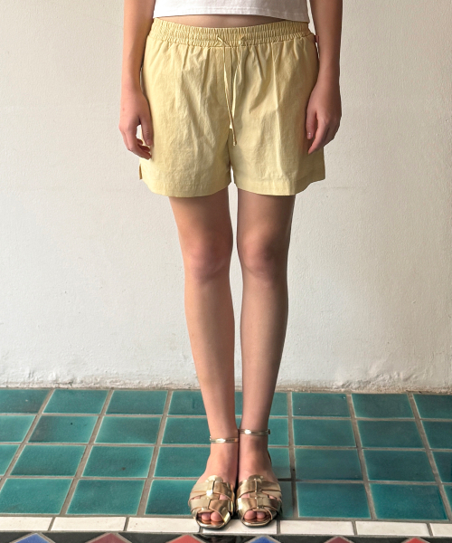 SINOON(シヌーン)の「Basic Point Label Shorts (Yellow)(その他パンツ・レディース・イエロー・FREE)」の1枚目の写真